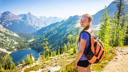 Girl Hiker Enjoying Lake Ann View from Maple Pass Trail © PhotoSpirit