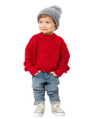 Little Caucasian toddler boy wearing red sweater and jeans with hands in pockets, isolated on white or transparent background