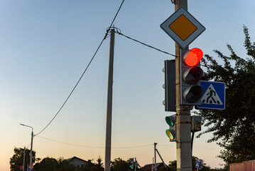 Adjustable pedestrian crossing with traffic lights.
