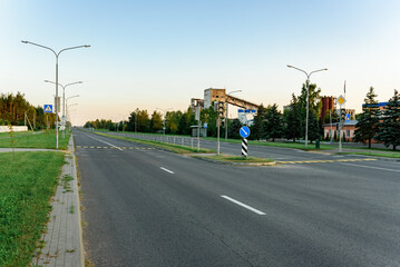 Adjustable pedestrian crossing with traffic lights.
