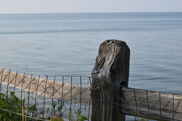 Wooden fence along the beach.
