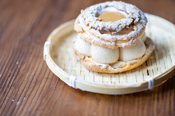 Close-Up of Pistachio and Pumpkin Christmas Paris-Brest Dessert

