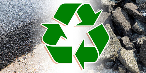 Cracked asphalt pieces after demolition of a road surface in a construction site for renovation...