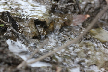 River water flowing over the rock