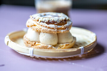 Close-Up of Pistachio and Pumpkin Christmas Paris-Brest Dessert
