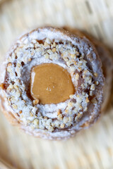 Close-Up of Pistachio and Pumpkin Christmas Paris-Brest Dessert
