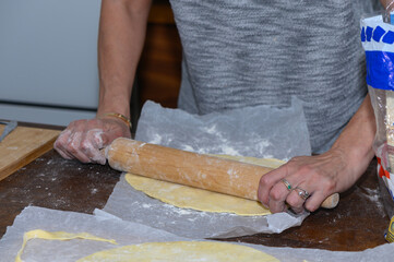 Female Hands Rolling Dough for Homemade Cake