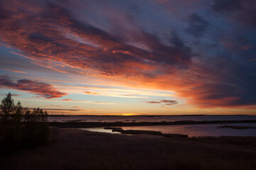 Sunset colours at the sky over marshlands in Pori, Finland