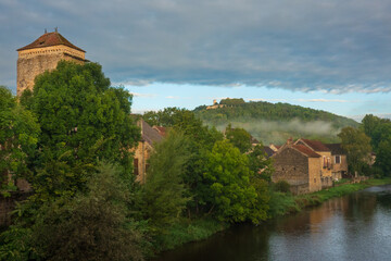 Early morning in the French village of Saint-Père, situated on the Cure River. On the hill in the distance the famous village of Vézelay
