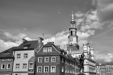 Historic tenement houses, a statue of Apollo and the tower of the Renaissance town hall on the market square in Poznan