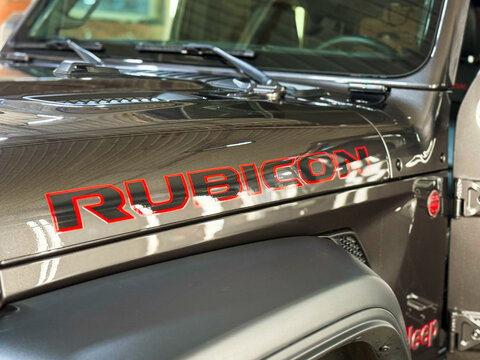 Jeep Rubicon Wrangler Unlimited recon edition logo on the fender. Jeep Rubicon Wrangler Unlimited American off-road us vehicle car is metallic. American SUV. 