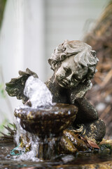 Cherubic Statue with Water Fountain Detail