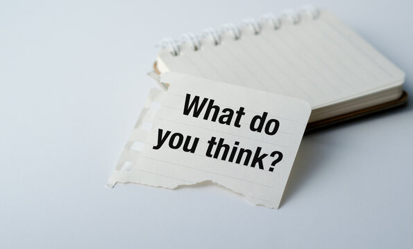 A piece of paper with the words "What do you think?" written on it