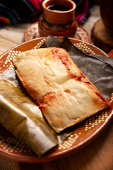 Oaxacan Tamale. Prehispanic dish typical of Mexico and some Latin American countries. Corn dough wrapped in banana leaves. The tamales are steamed.