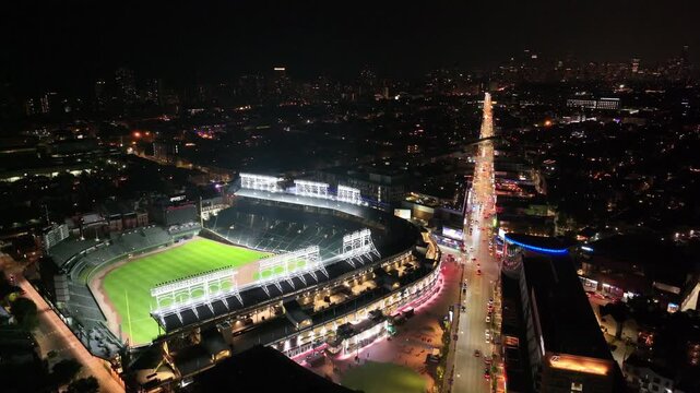 Aerial Night View of Chicago Baseball Stadium Illuminated at Night&rdquo;