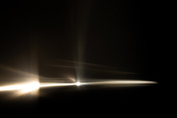 Lens Flare. Light over black background. Easy to add overlay or screen filter over photos. Abstract...
