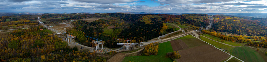 Vibrant 360 Aerial Panorama: S19 Viaduct Construction Over Fiery Autumn Valley