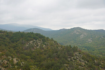Mountain landscape panorama rocks stones trees forest Balkans autumn cloudy day nature