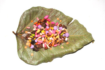 Colorful paan masala on a white isolated background