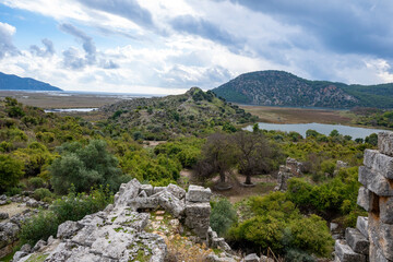 Kaunos (Carian: Kbid Lycian: Xbide Ancient Greek: &Kappa;&alpha;ῦ&nu;&omicron;&sigmaf;; Latin: Caunus) ancient city was a city of ancient Caria and in Anatolia, a few kilometres west of the modern town of Dalyan. Amphitheatre area