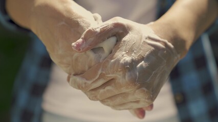 wash hands with soap close-up, foam the gel to remove dirt, cleanse the pores of the skin from viros microbes, healthcare, follow a healthy lifestyle, coronavirus, hand care with disinfectants.