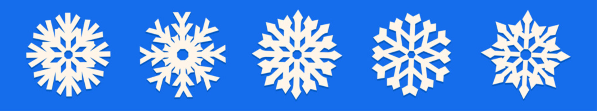 Collection of simple white paper cut out snowflakes on a bright blue background. Festive winter illustration for Christmas projects, holiday wrapping, seasonal prints, and greeting card designs.