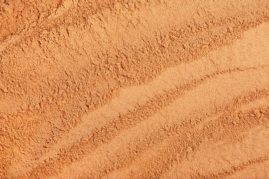 Incense - chandan or sandalwood powder as background, top view. Ayurvedic cosmetic.