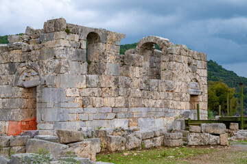 Naklejka premium Kaunos (Carian: Kbid Lycian: Xbide Ancient Greek: Καῦνος; Latin: Caunus) ancient city was a city of ancient Caria and in Anatolia, a few kilometres west of the modern town of Dalyan. Amphitheatre area