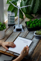 Ecology project, sustainable development education at school. Kid doing scientific research on...