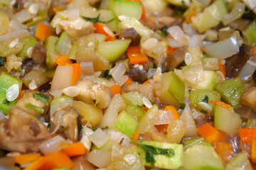 Ragout is cooked in pan. Vegetable stew