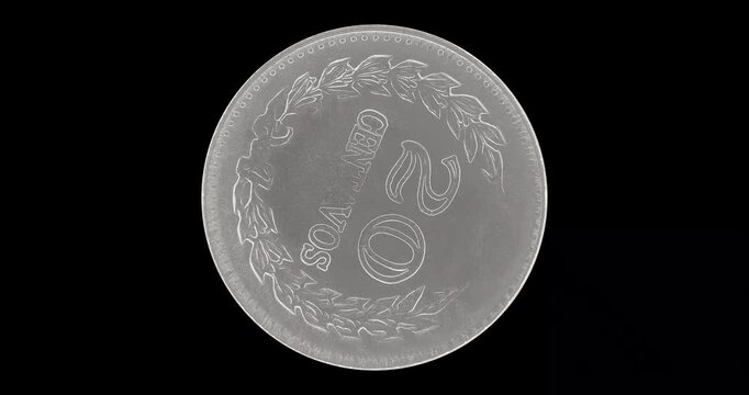 Reverse of Colombia coin 20 centavos 1970, isolated in black background. Loopable animation in 4k resolution video