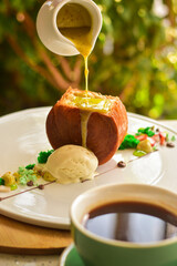 Pistachio NY roll served with ice cream and elegant decorative toppings. A gourmet dessert image highlighting the nutty flavor, creamy ice cream, and artistic presentation, perfect for food, pastry, a