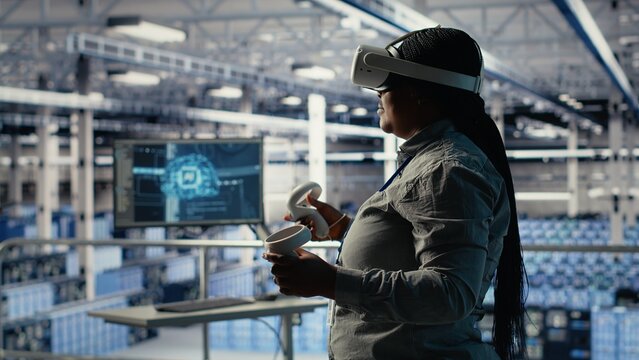 Data center technician using virtual reality, improving AI rigs processing speed. Server hub IT expert using VR headset to manage gear providing support for artificial intelligence workloads, camera B - Powered by Adobe