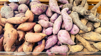 mixed color of sweet potatoes background, sell in the local market