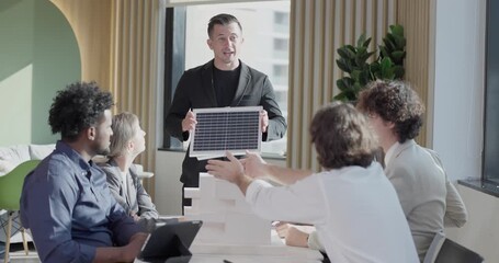 Startup team assess efficiency in renewable resource usage. Calculate cost saving for sustainable building improvements, like solar panels. Plan eco-friendly changes, conscious electricity consumption