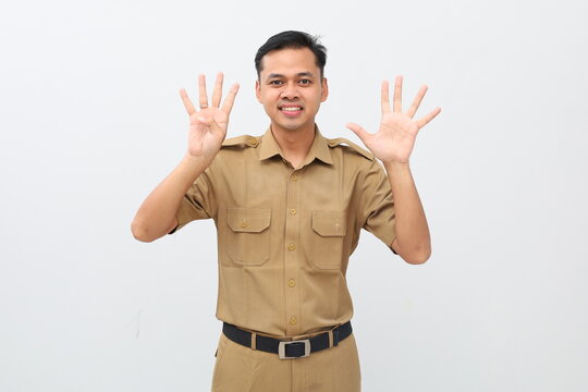 Attractive Indonesian government worker showing nine fingers