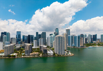 Obraz premium Aerial view of Brickell skyline in downtown Miami. Modern skyscrapers rise above Biscayne Bay. Scenic panorama of Miamis financial district.