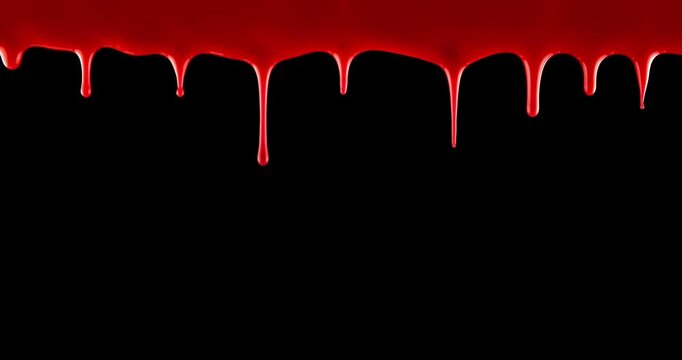 Vivid red blood flowing down over black and green screen. Blood red drops dripping down. Scary bleeding overlay showing frightening violence, an injury, terror, or a spooky Halloween background.