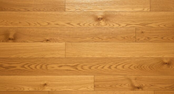 Wood flooring planks of light brown wood with distinct grains and knots create a polished floor surface