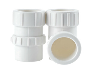 Two white plastic plumbing fittings, one a straight coupling, the other a tee, displayed against a black background