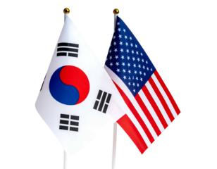 Two national flags, South Korean & USA, stand against a black background, symbolizing unity or collaboration