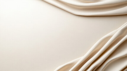 Obraz premium Soft beige fabric with gentle folds and smooth texture creates elegant backdrop