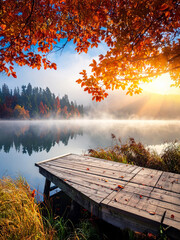 Whispers of the Fog: A Tranquil Autumn Lake Embracing a Lonely Wooden Pier