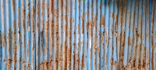 Old zinc vintage fence wall texture for background, pattern of rusty on metal panel.Tin Roof wall countryside	
