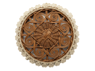 Round woven wicker placemat with an ornate lace border on a transparent background
