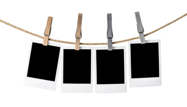 Four Instant Photo Frames Hanging on Rope isolated on white and transparent