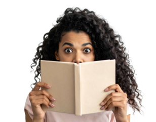 Young woman hides face behind a book, eyes wide in surprise, against transparent dark background