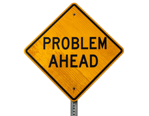 Yellow diamond road sign with black text "PROBLEM AHEAD" against a stark black background