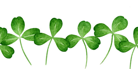 Fototapeta premium Green clover leaf seamless border decoration element. Hand drawn watercolor vintage style illustration. Clover green leaves floral decor isolated on white background