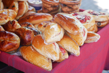 Freshly baked pastries displayed at a local market stand